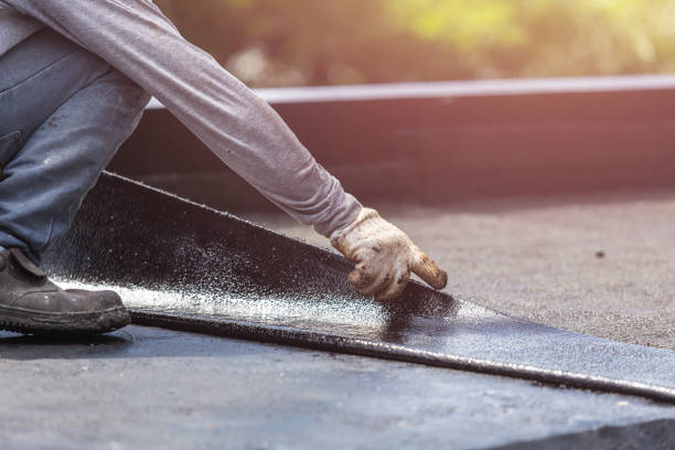 Professional Emergency Waterproofing technician working in Petersburg, KY